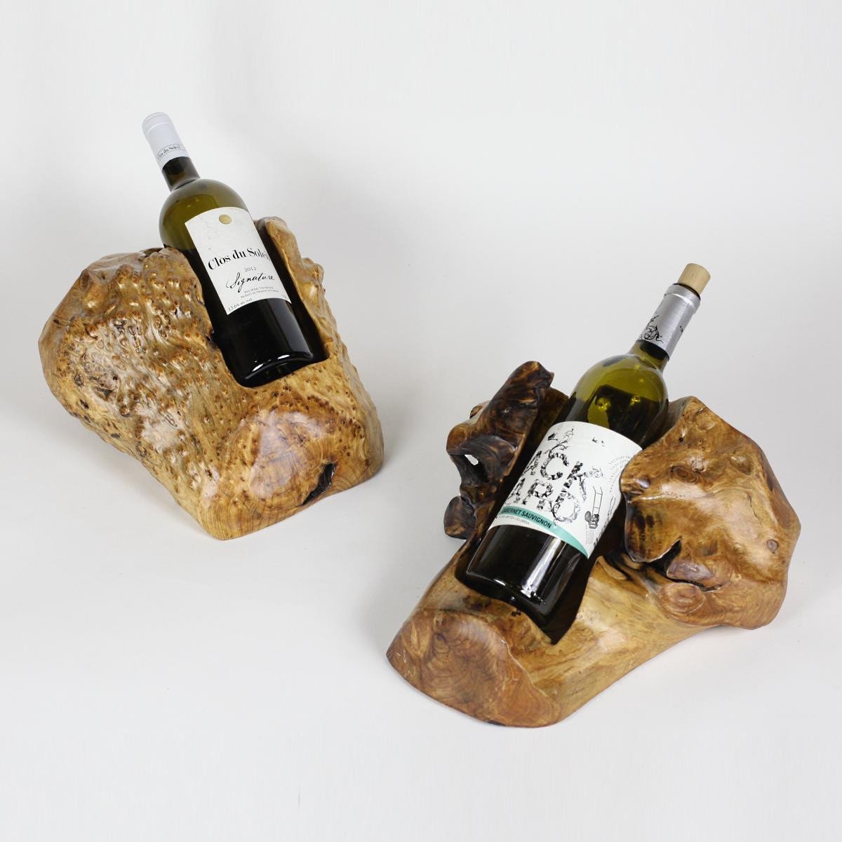 FUNCTIONAL ART is the best way to describe Greener Valley's stunning collection of stumps and roots that have been handcrafted into beautiful wine holders, cheese boards, platters, bowls and stools. Handcrafted from the roots and stumps of the Asian Cypress known as Shan Mu. These beautiful stools function equally well as a stool, end table or plant stand. Each piece is absolutely unique. This stool measures 24" high.