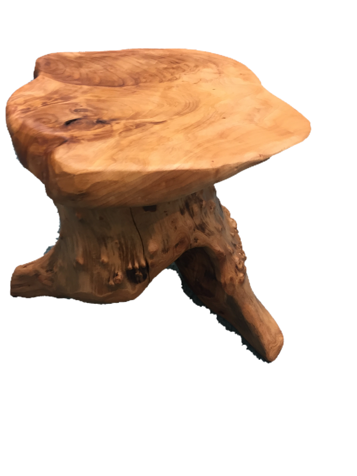 FUNCTIONAL ART is the best way to describe Greener Valley's stunning collection of stumps and roots that have been handcrafted into beautiful wine holders, cheese boards, platters, bowls and stools. Handcrafted from the roots and stumps of the Asian Cypress known as Shan Mu. These beautiful stools function equally well as a stool, end table or plant stand. Each piece is absolutely unique. This stool measures 24" high.