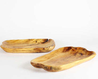 FUNCTIONAL ART is the best way to describe Greener Valley's stunning collection of stumps and roots that have been handcrafted into beautiful wine holders, cheese boards, platters, bowls and stools. Handcrafted from the roots and stumps of the Asian Cypress known as Shan Mu. These beautiful stools function equally well as a stool, end table or plant stand. Each piece is absolutely unique. This stool measures 24" high.