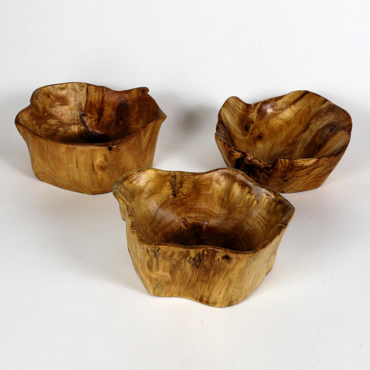 FUNCTIONAL ART is the best way to describe Greener Valley's stunning collection of stumps and roots that have been handcrafted into beautiful wine holders, cheese boards, platters, bowls and stools. Handcrafted from the roots and stumps of the Asian Cypress known as Shan Mu. These beautiful stools function equally well as a stool, end table or plant stand. Each piece is absolutely unique. This stool measures 24" high.