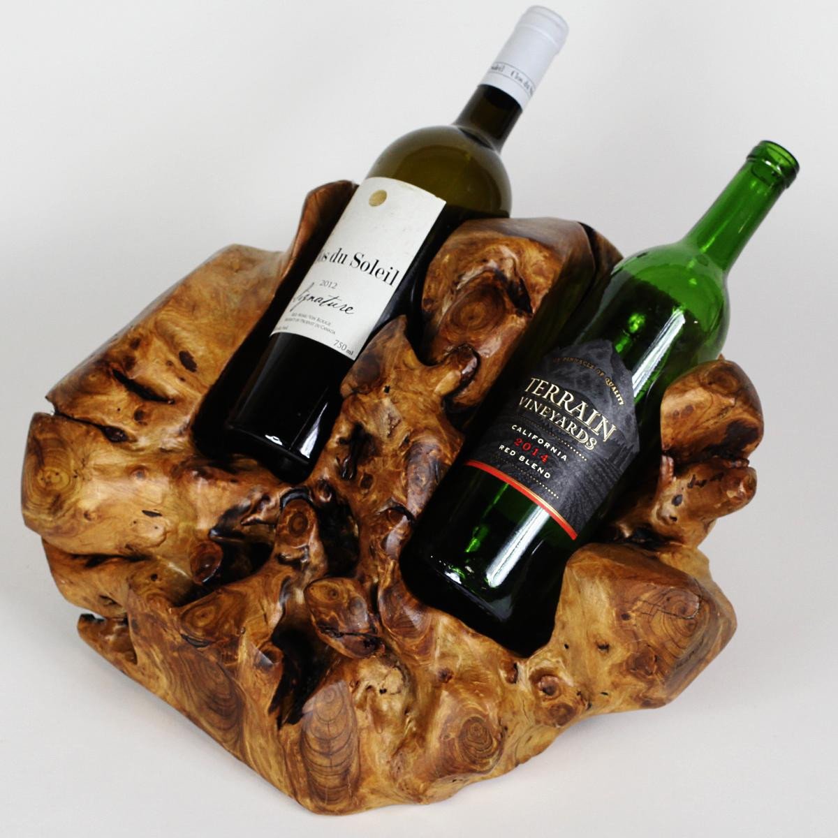 FUNCTIONAL ART is the best way to describe Greener Valley's stunning collection of stumps and roots that have been handcrafted into beautiful wine holders, cheese boards, platters, bowls and stools. Handcrafted from the roots and stumps of the Asian Cypress known as Shan Mu. These beautiful stools function equally well as a stool, end table or plant stand. Each piece is absolutely unique. This stool measures 24" high.
