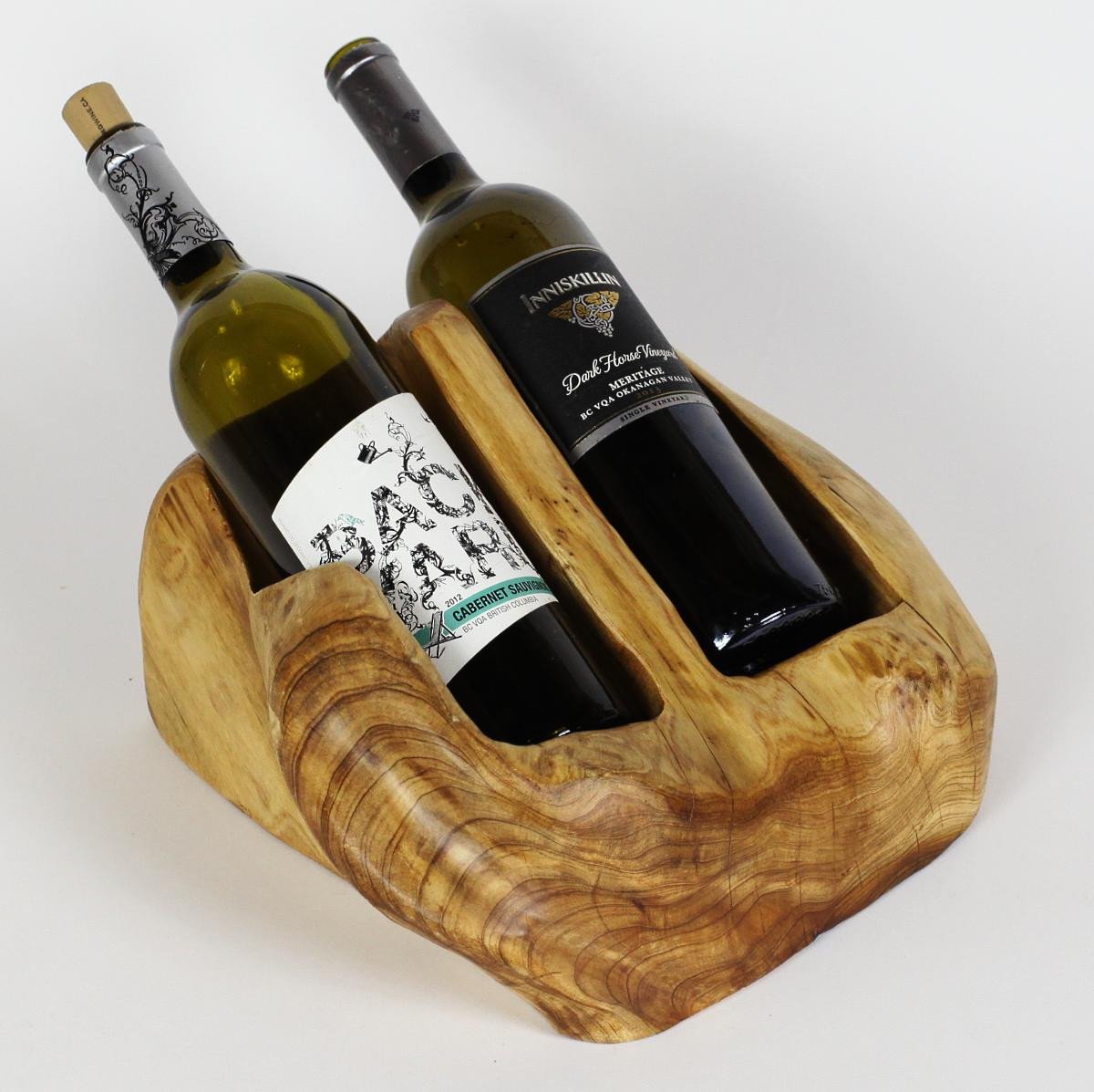 FUNCTIONAL ART is the best way to describe Greener Valley's stunning collection of stumps and roots that have been handcrafted into beautiful wine holders, cheese boards, platters, bowls and stools. Handcrafted from the roots and stumps of the Asian Cypress known as Shan Mu. These beautiful stools function equally well as a stool, end table or plant stand. Each piece is absolutely unique. This stool measures 24" high.
