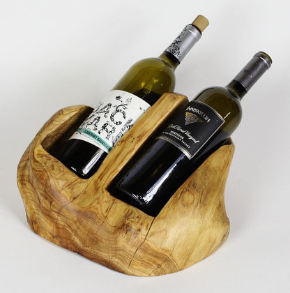 FUNCTIONAL ART is the best way to describe Greener Valley's stunning collection of stumps and roots that have been handcrafted into beautiful wine holders, cheese boards, platters, bowls and stools. Handcrafted from the roots and stumps of the Asian Cypress known as Shan Mu. These beautiful stools function equally well as a stool, end table or plant stand. Each piece is absolutely unique. This stool measures 24" high.