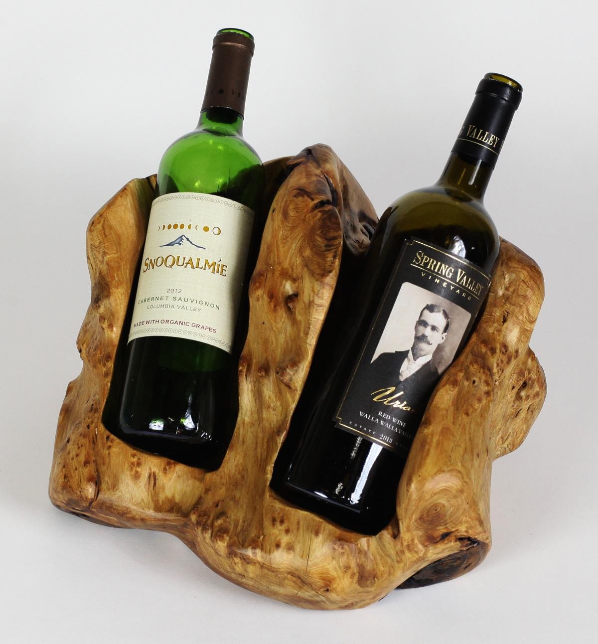 FUNCTIONAL ART is the best way to describe Greener Valley's stunning collection of stumps and roots that have been handcrafted into beautiful wine holders, cheese boards, platters, bowls and stools. Handcrafted from the roots and stumps of the Asian Cypress known as Shan Mu. These beautiful stools function equally well as a stool, end table or plant stand. Each piece is absolutely unique. This stool measures 24" high.