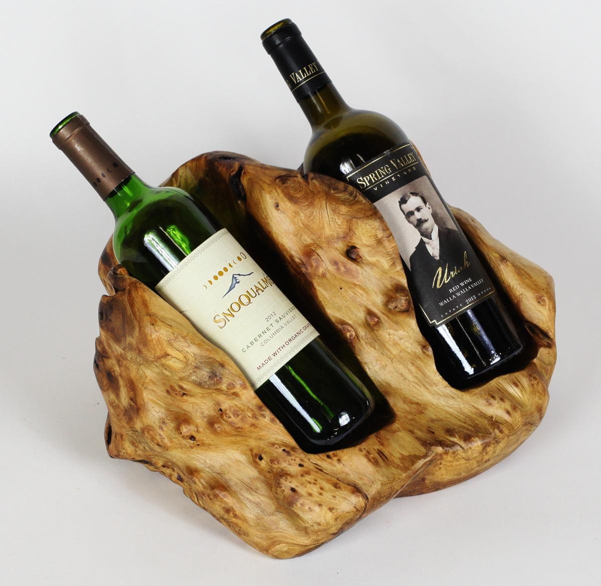 FUNCTIONAL ART is the best way to describe Greener Valley's stunning collection of stumps and roots that have been handcrafted into beautiful wine holders, cheese boards, platters, bowls and stools. Handcrafted from the roots and stumps of the Asian Cypress known as Shan Mu. These beautiful stools function equally well as a stool, end table or plant stand. Each piece is absolutely unique. This stool measures 24" high.