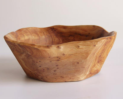 FUNCTIONAL ART is the best way to describe Greener Valley's stunning collection of stumps and roots that have been handcrafted into beautiful wine holders, cheese boards, platters, bowls and stools. Handcrafted from the roots and stumps of the Asian Cypress known as Shan Mu. These beautiful stools function equally well as a stool, end table or plant stand. Each piece is absolutely unique. This stool measures 24" high.