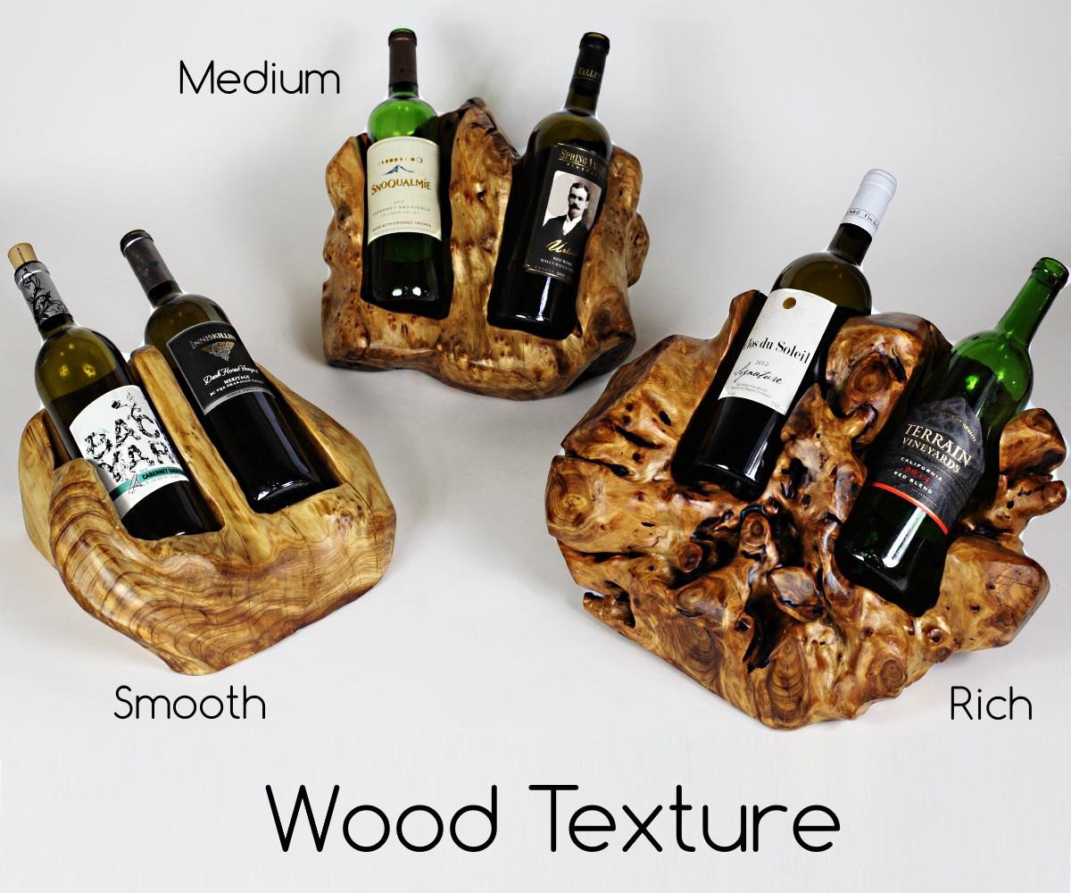 FUNCTIONAL ART is the best way to describe Greener Valley's stunning collection of stumps and roots that have been handcrafted into beautiful wine holders, cheese boards, platters, bowls and stools. Handcrafted from the roots and stumps of the Asian Cypress known as Shan Mu. These beautiful stools function equally well as a stool, end table or plant stand. Each piece is absolutely unique. This stool measures 24" high.